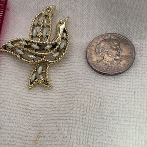 Gold-Tone Gerry’S Dove Brooch with Green Marquise Accents